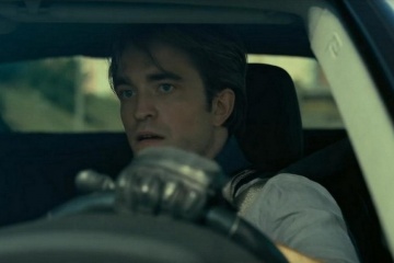 Tenet - Robert Pattinson 'Neil' in una foto di scena - Tenet